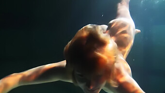 Beautiful Women Swim And Disrobe Underwater