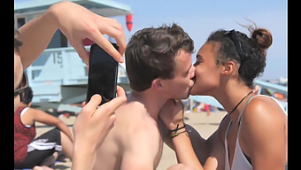 African-American Girl Shares Passionate Kisses With White Boys On The Shore