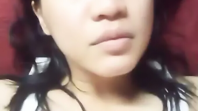 Alone Asian girl indulges in solo play with fruit at home